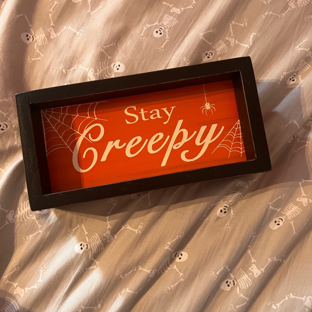 Stay Creepy wall sign